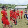 Equipe de foot féminin sur stade 2
