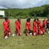 Equipe de foot féminin sur le stade